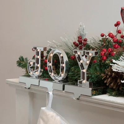 Northlight LED Lighted "JOY" Christmas Stocking Holder - 6.5" - Silver Finish - Set Of 3 1 Northlight LED Lighted "JOY" Christmas Stocking Holder - 6.5" - Silver Finish - Set Of 3