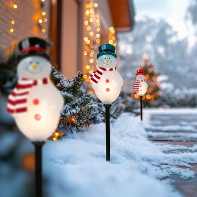 Northlight Lighted Snowmen Christmas Outdoor Pathway Markers - 16" - Set Of 3 1 Northlight Lighted Snowmen Christmas Outdoor Pathway Markers - 16" - Set Of 3